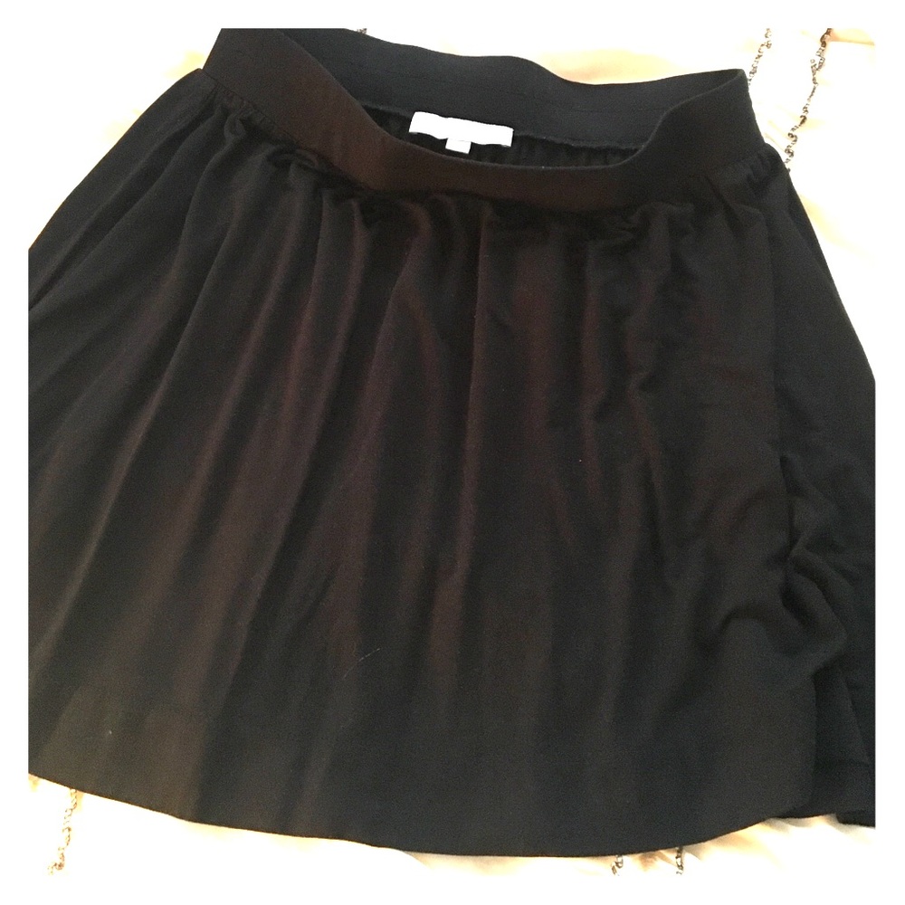 Black skirt- mid leg length above knee